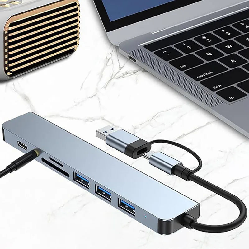 Hub USB-C 8 en 1 con 4 puertos USB, 1 conector USB-C, lector de tarjetas TF/SD y salida de audio de 3,5 mm para MacBook Pro, iPad Pro, iPhone 15 y portátiles.
